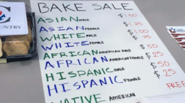 Photo showing pricing for cookies 'based on race'